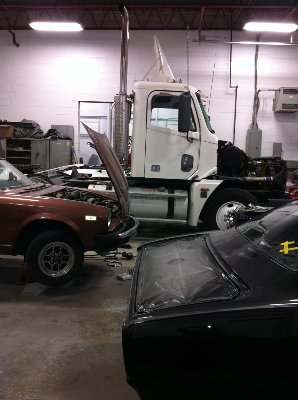 Side view of mac truck in shop